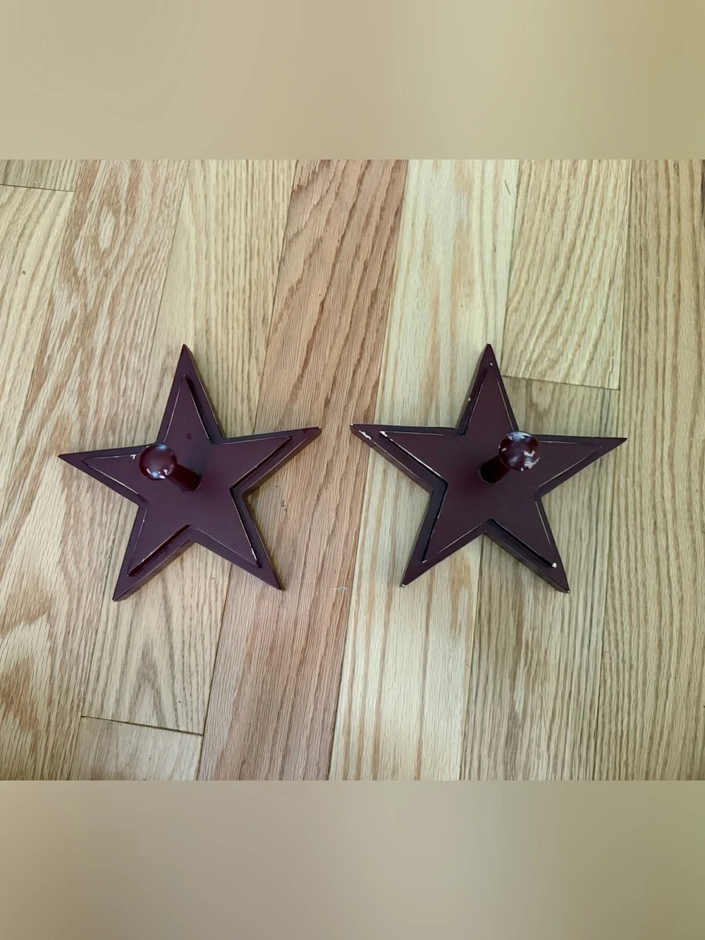 Pottery Barn distressed star shaped wall hooks maroon color 7”